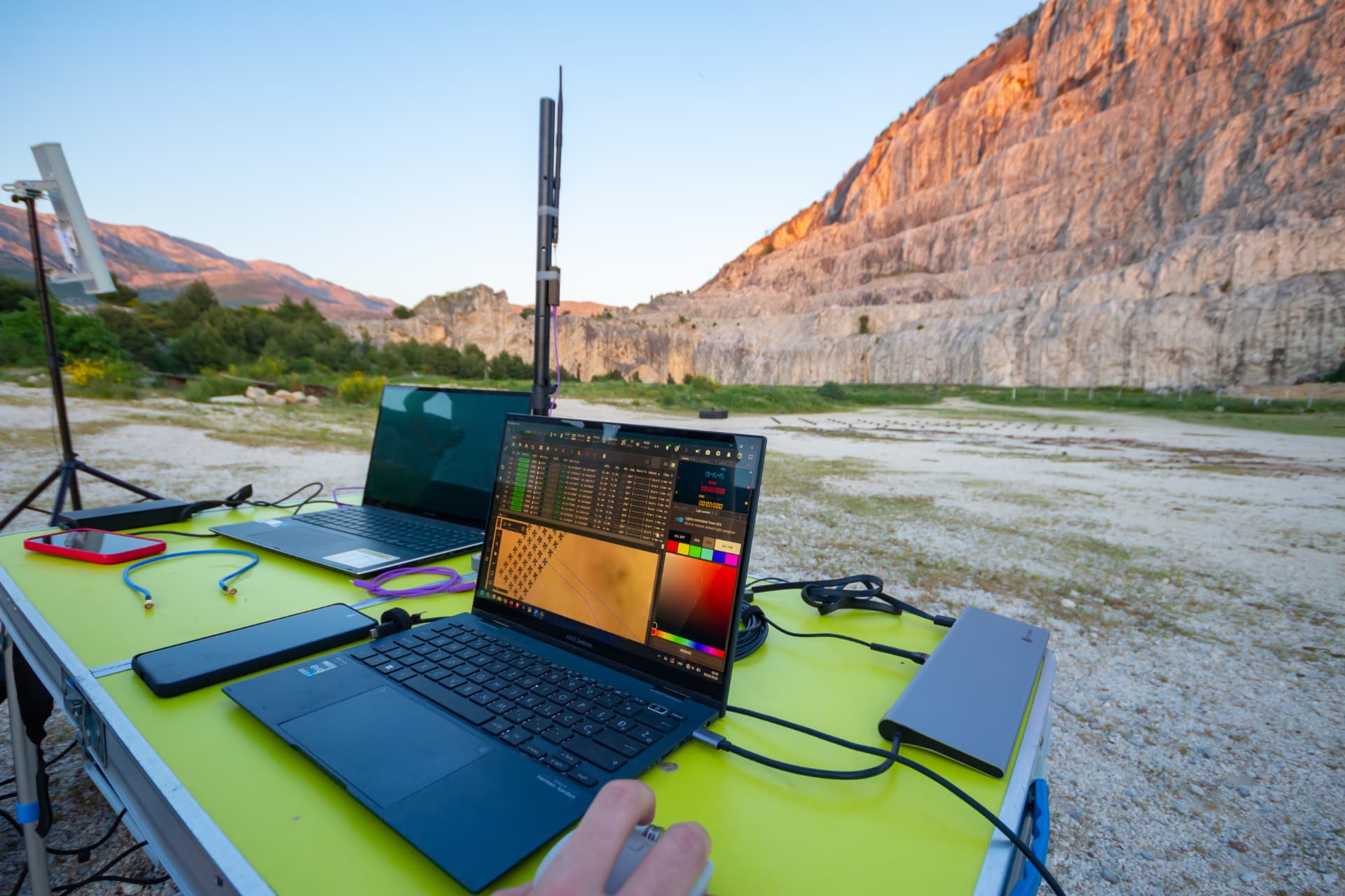 LightX ground station laptops running swarm control software on site